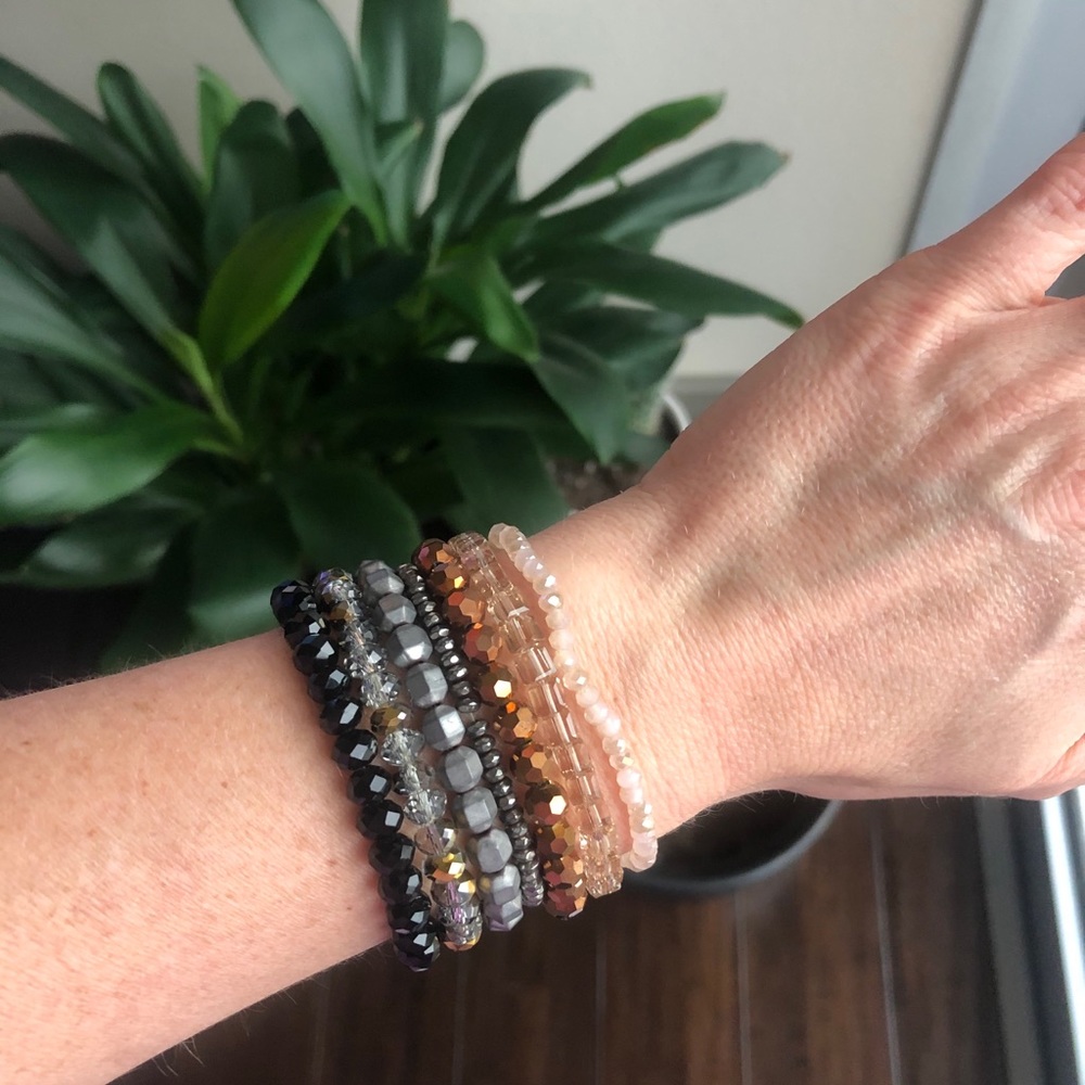 Bundle of beaded fashion bracelets.